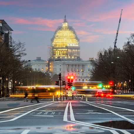 home-01 Road to the Capitol building in Washington DC at dusk.